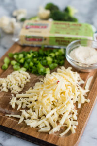 cutting board with shredded cheese